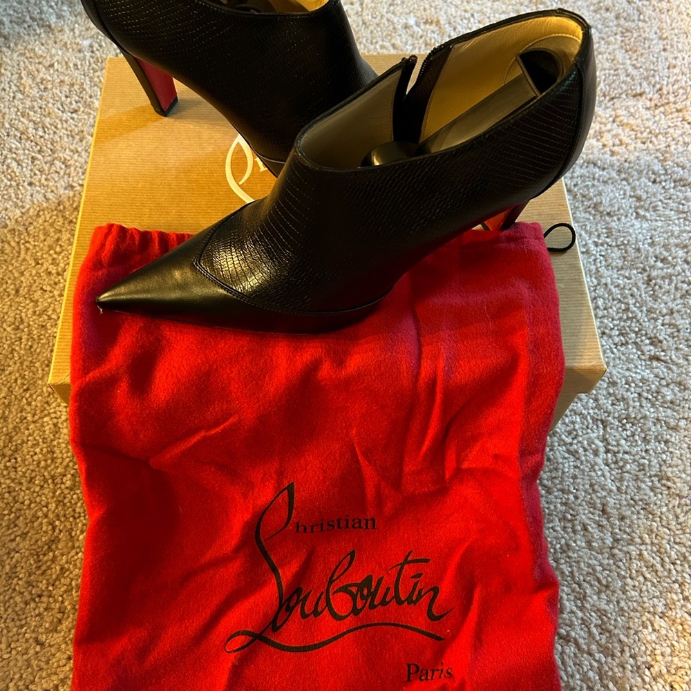 Size 38 1/2. Christian louboutin booties